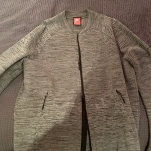 Nike full zip bomber jacket! Worn only a couple times and in amazing shape.